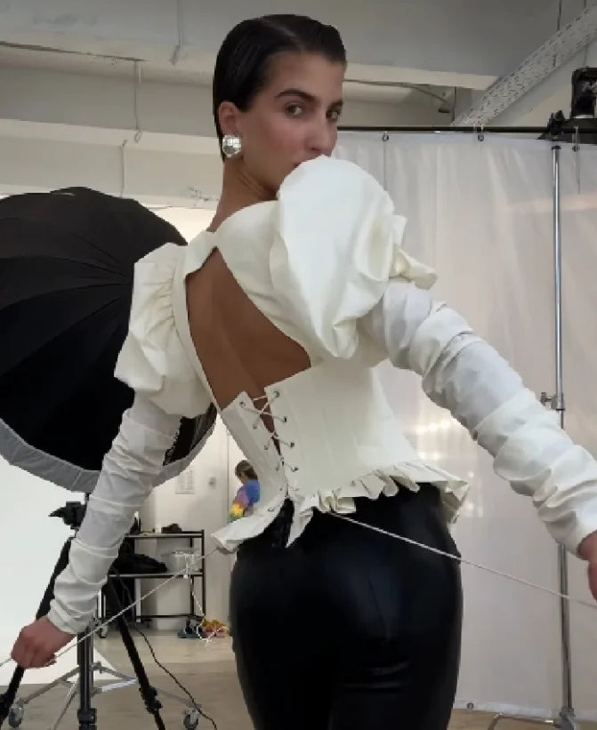 Back view of White Corset Crop Top, Puff Sleeve and Lace-Up Back Design