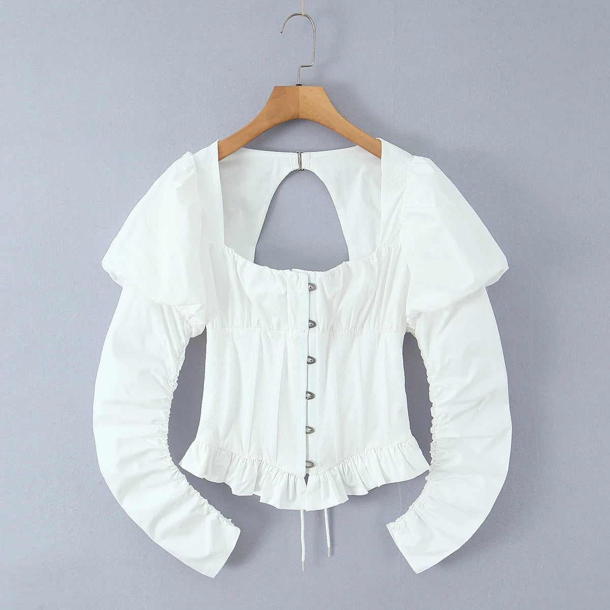 Front view of Puff Sleeve Corset Blouse, Square Neck and Ruffle Hem